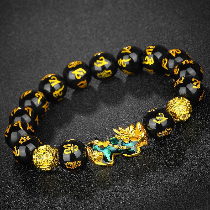 Six-word mantra engraved obsidian bracelet featuring Pixiu charm, designed to attract good luck and prosperity.